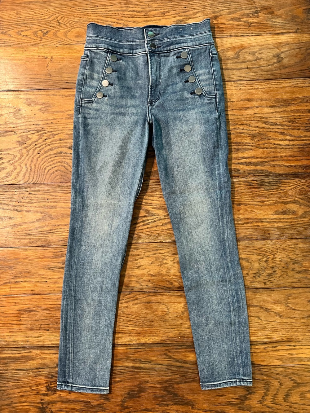 Express Skinny Jeans in Faded Blue with Button Accent